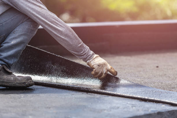 Professional Basement Waterproofing technician working in Toledo, OR